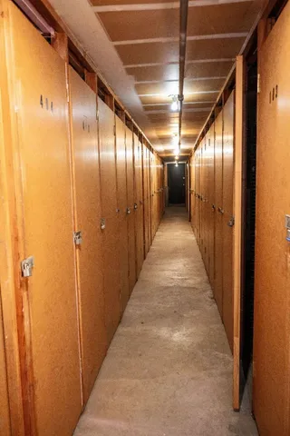 a view of gallery with wooden floor