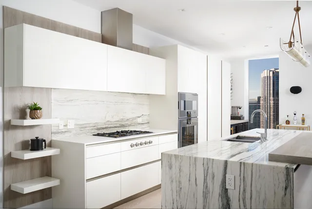 a kitchen with a stove and a refrigerator