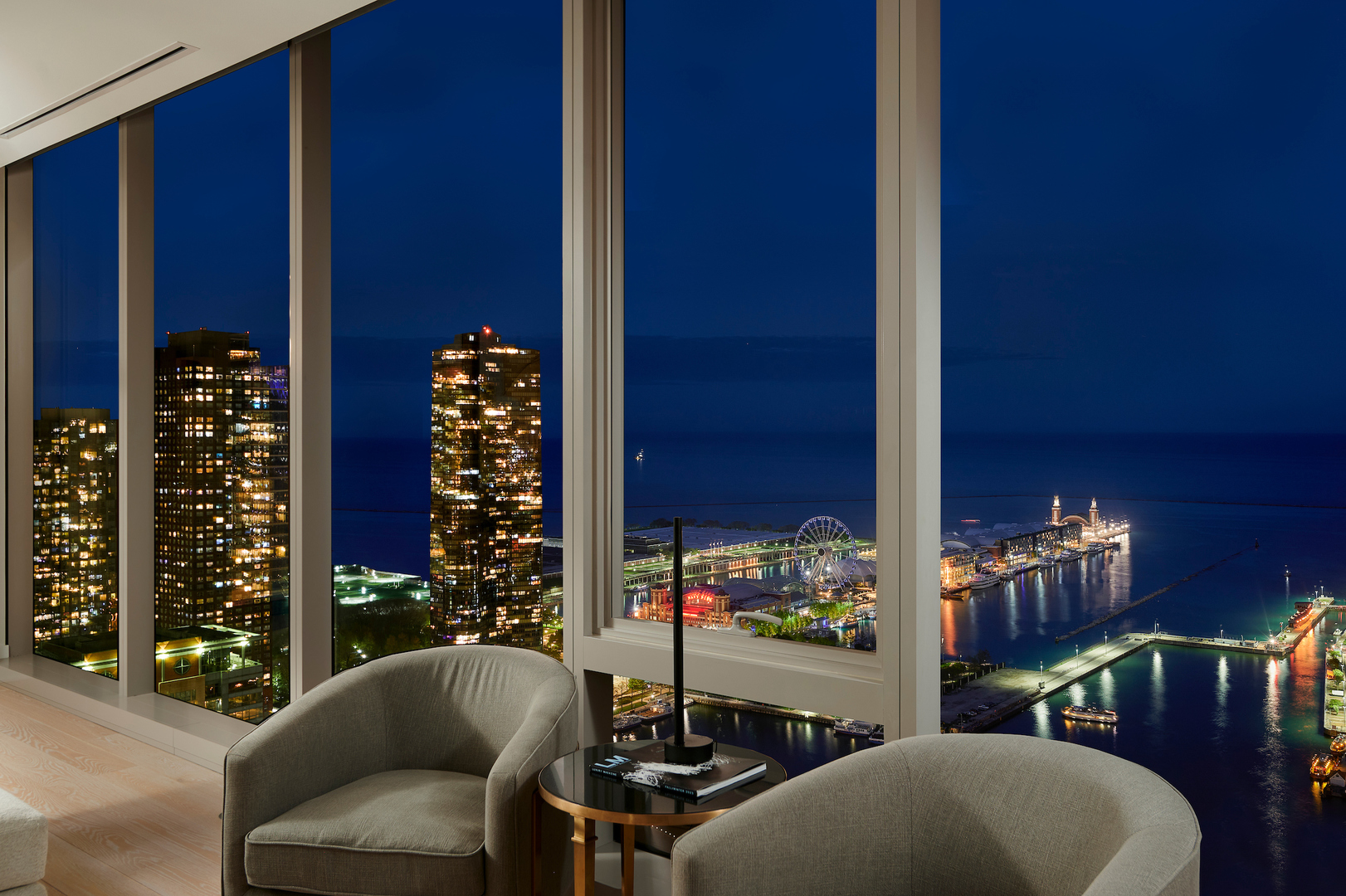 363 East Wacker Drive, Unit 3608 Chicago, IL 60601 - Photo 6 of 30 a view of balcony with chairs and potted plants