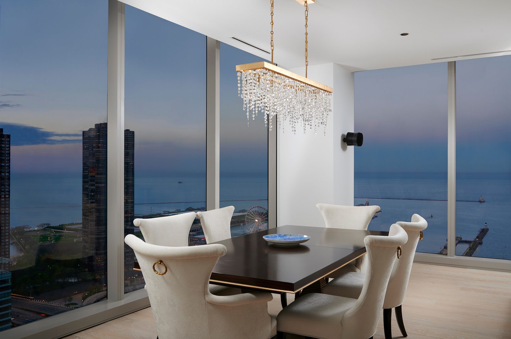 363 East Wacker Drive, Unit 3608 Chicago, IL 60601 - Photo 9 of 30 a white table and chairs in a room