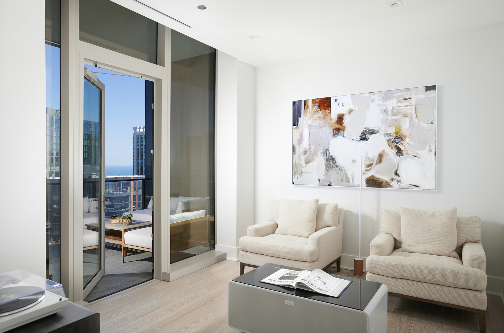 363 East Wacker Drive, Unit 3608 Chicago, IL 60601 - Photo 10 of 30 a living room with furniture and a window