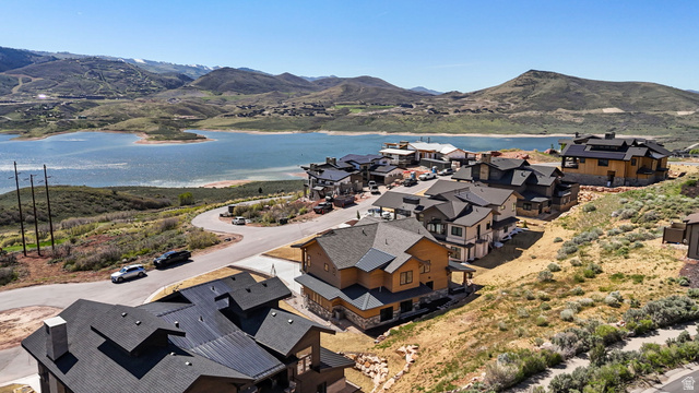 10646 North Reflection Ridge Hideout, UT 84036 - Photo 43 of 43 Aerial perspective showcasing a residential community with lake scenery and distant mountains