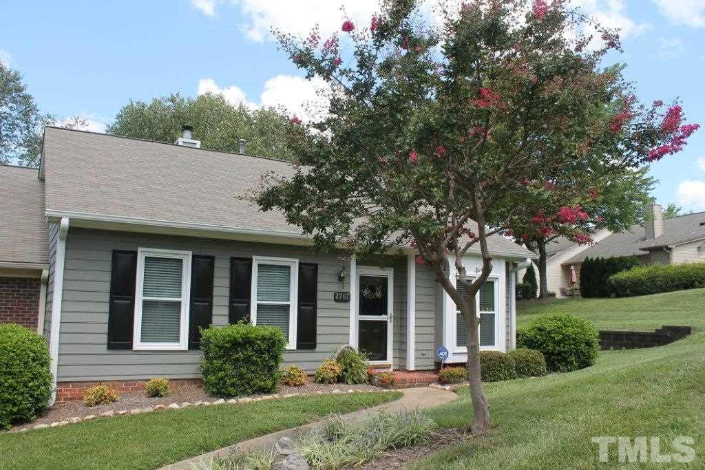 2707 Cottage Circle Raleigh, NC 27613 - Photo 1 of 21 front view of a house with a yard