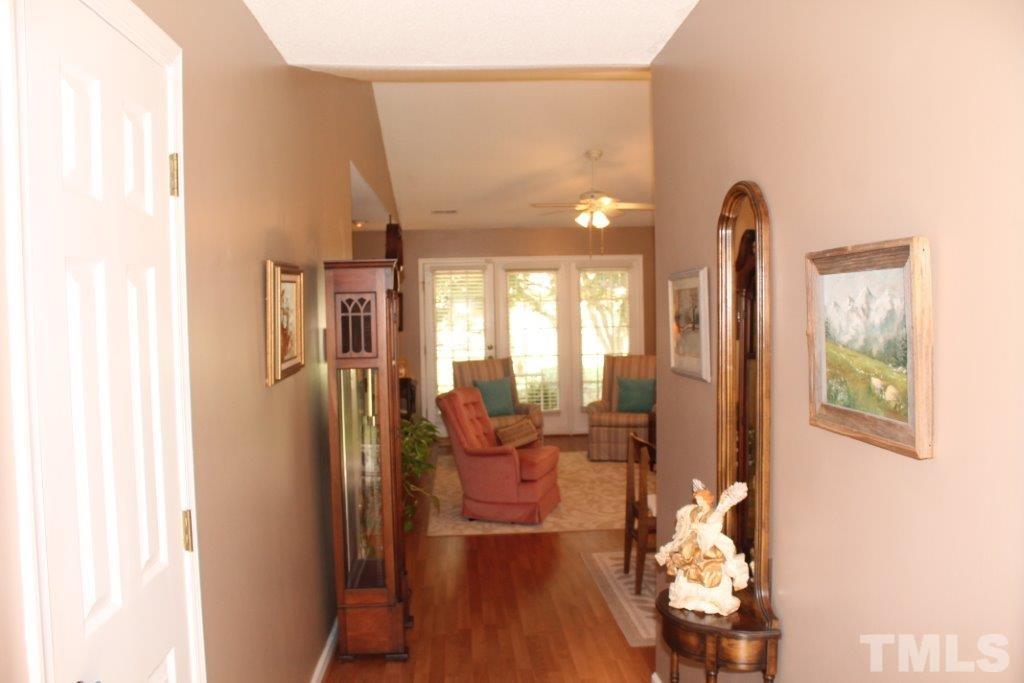 2707 Cottage Circle Raleigh, NC 27613 - Photo 2 of 21 a view of a living room with furniture and a large window