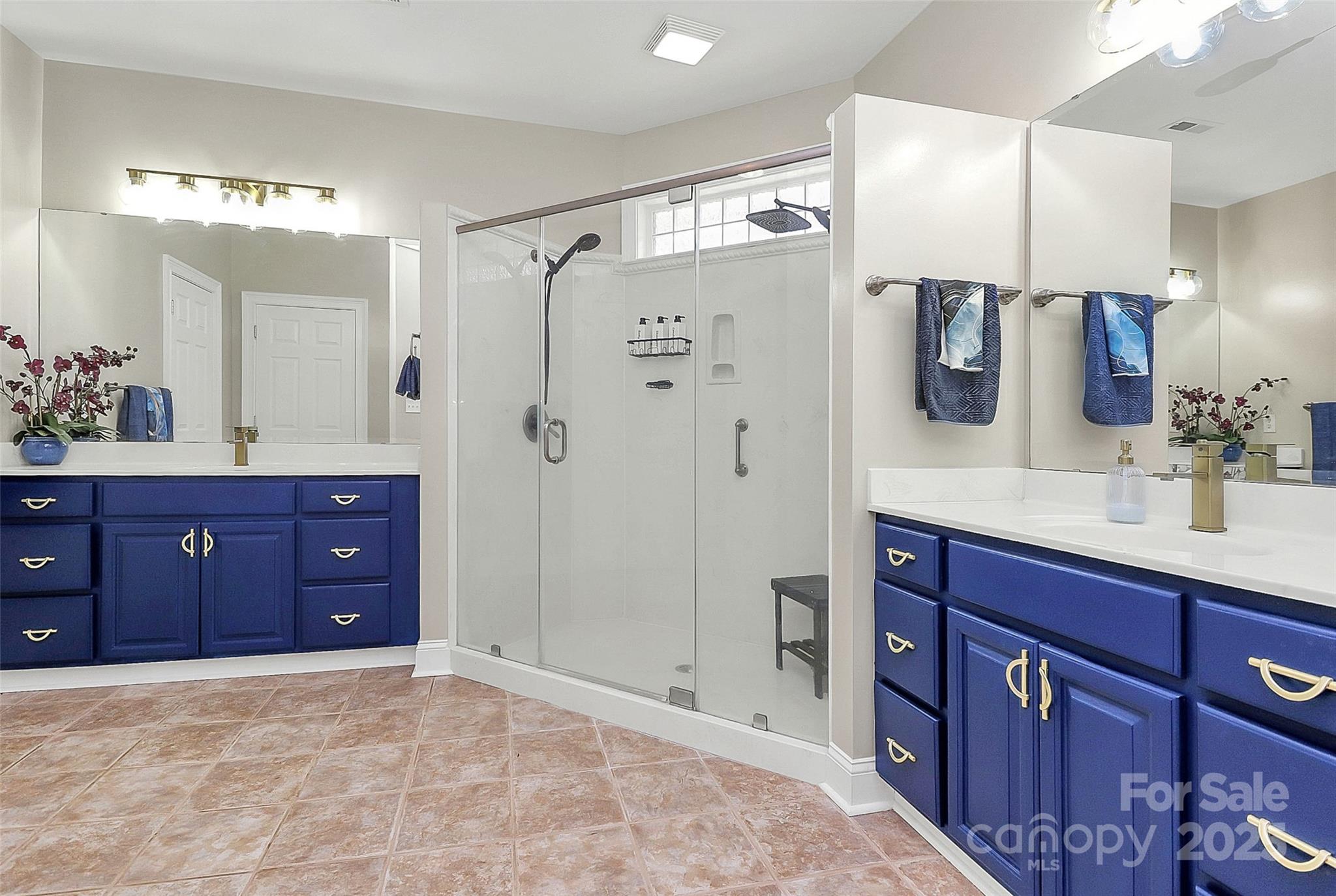 514 Bethel School Road Clover, SC 29710 - Photo 13 of 28 a bathroom with a granite countertop sink a shower a mirror and vanity
