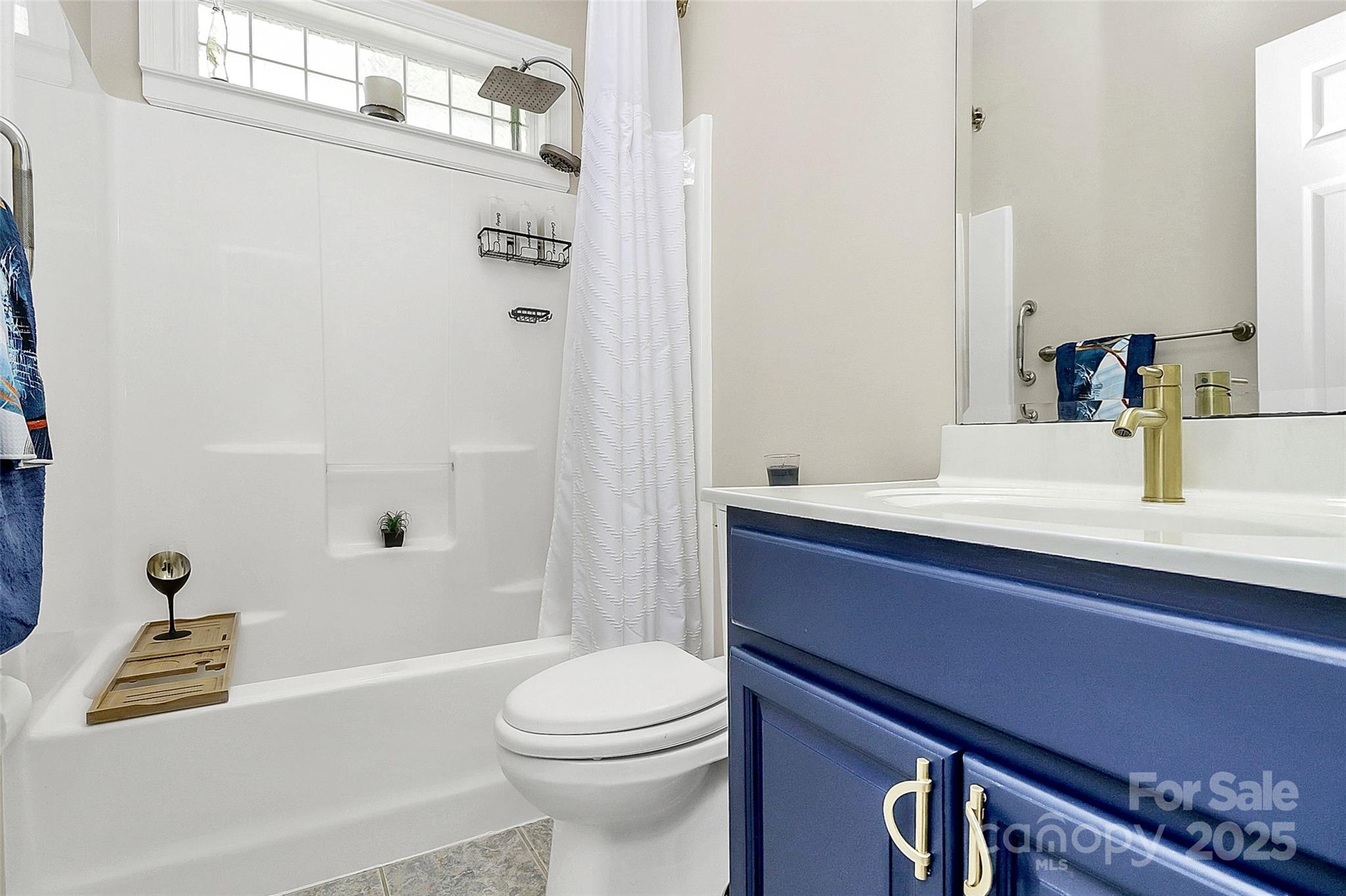 514 Bethel School Road Clover, SC 29710 - Photo 18 of 28 a bathroom with a sink a toilet and shower
