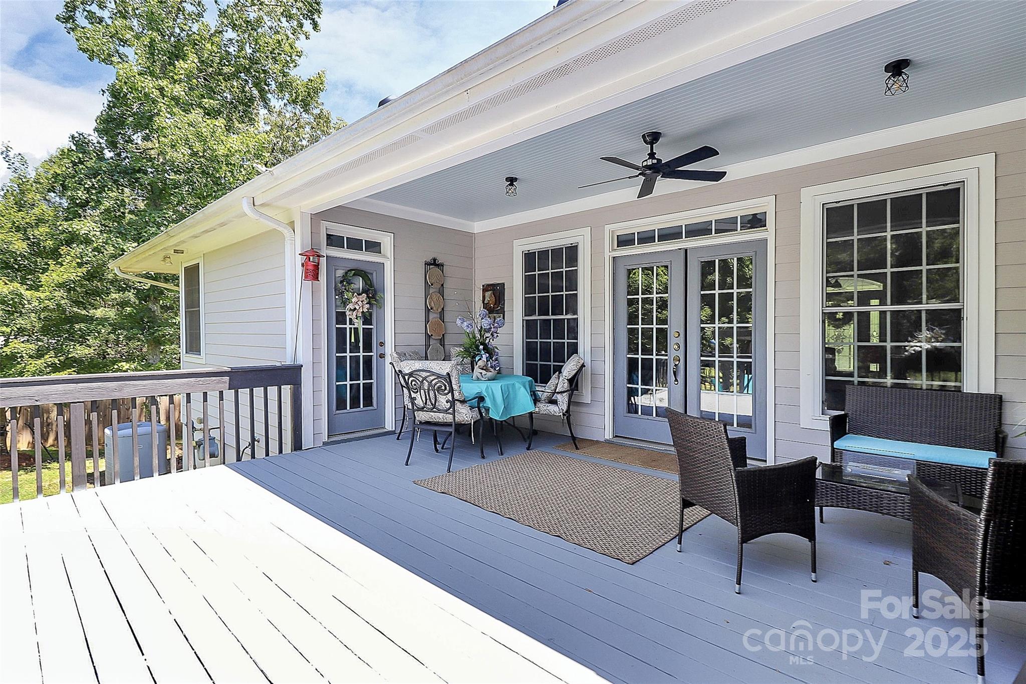 514 Bethel School Road Clover, SC 29710 - Photo 20 of 28 a view of a deck with table and chairs and wooden floor