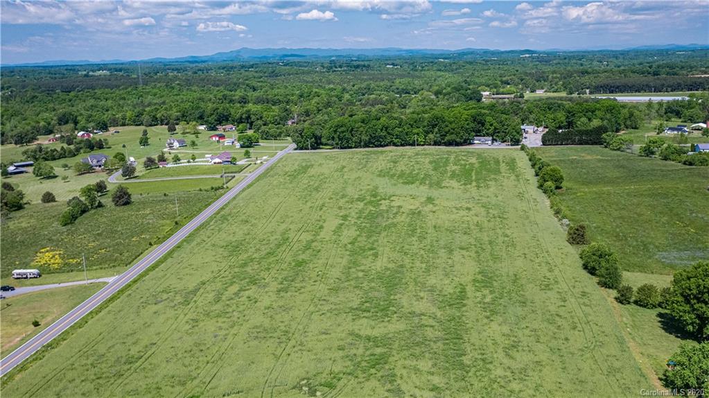 3 Reepsville Road Vale, NC 28168 - Photo 5 of 9 a view of a green field with a yard