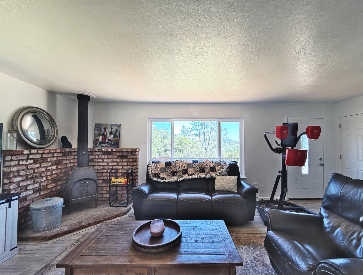 19310 Branding Iron Road Penn Valley, CA 95946 - Photo 12 of 30 a living room with furniture and a wooden floor