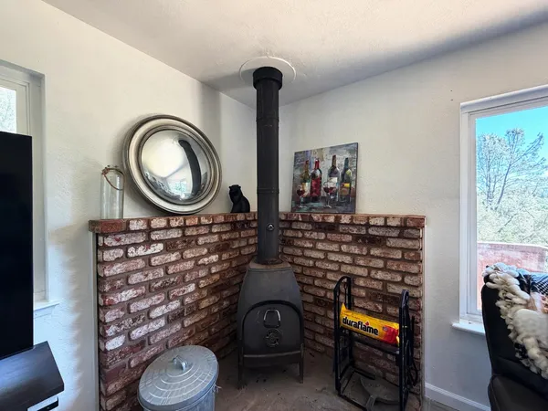 a view of living room with furniture and a window