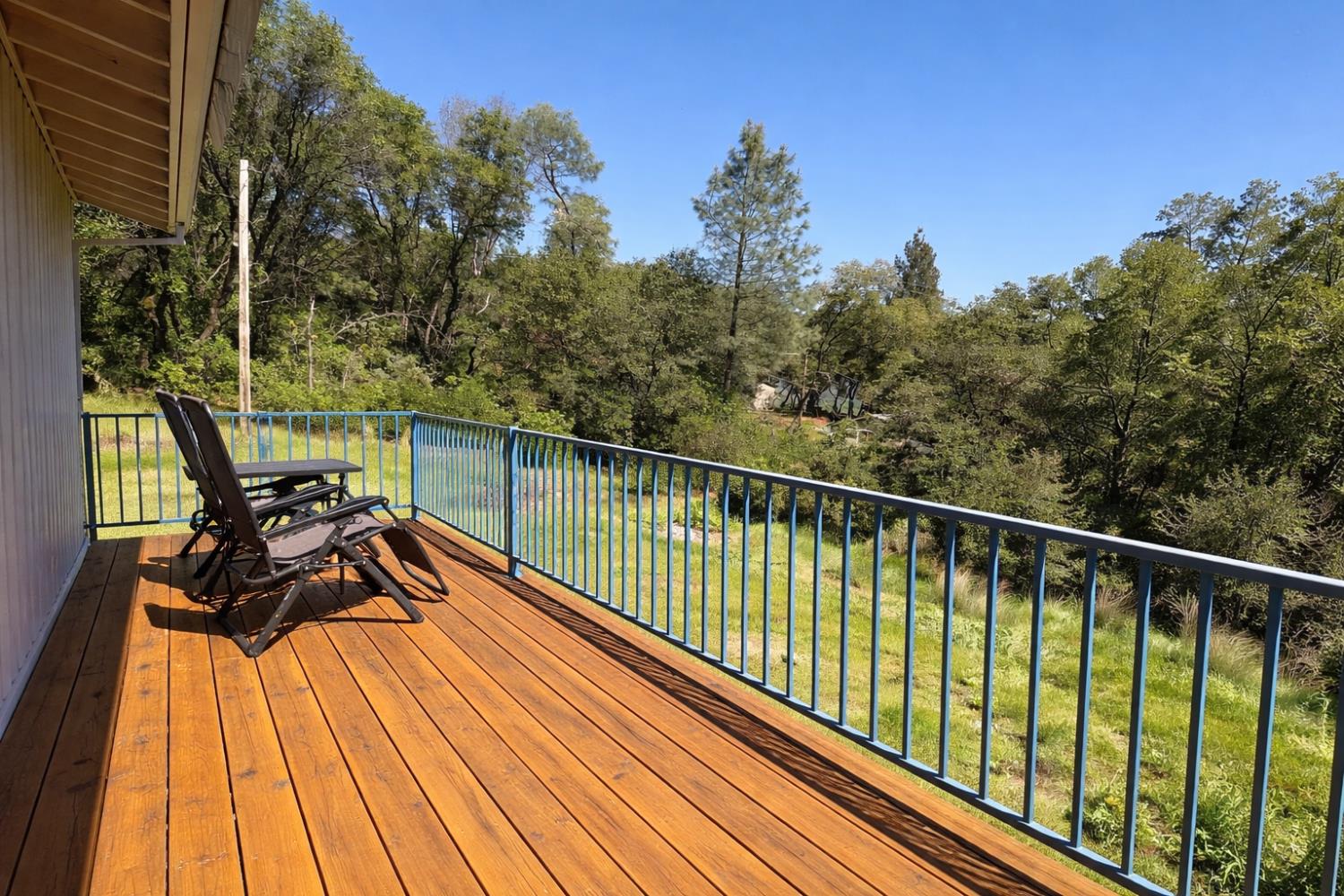 19310 Branding Iron Road Penn Valley, CA 95946 - Photo 23 of 30 a view of a balcony with chairs