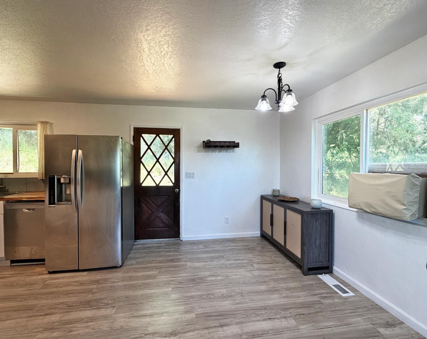 19310 Branding Iron Road Penn Valley, CA 95946 - Photo 6 of 30 a kitchen with stainless steel appliances granite countertop a refrigerator and a stove