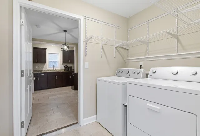 a utility room with dryer and washer