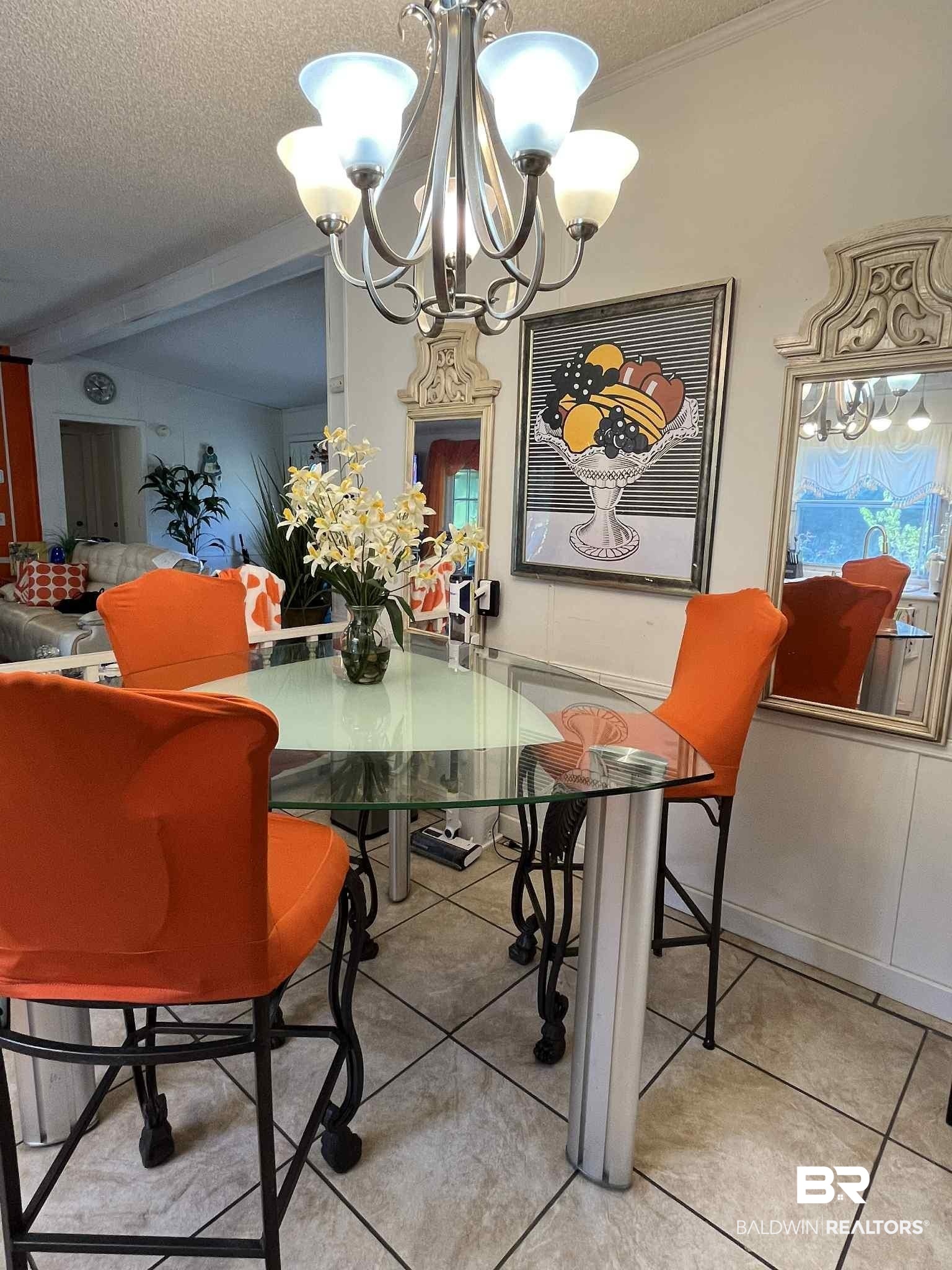 15418 Pine Grove Road Bay Minette, AL 36507 - Photo 4 of 18 Dining area with a textured ceiling, light tile patterned floors, a chandelier, and beamed ceiling