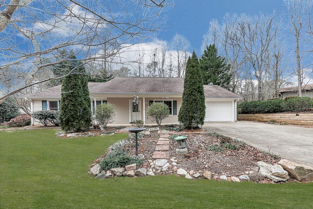 50 Piney Ridge Road Jasper, GA 30143 - Photo 1 of 1 a front view of a house with a yard