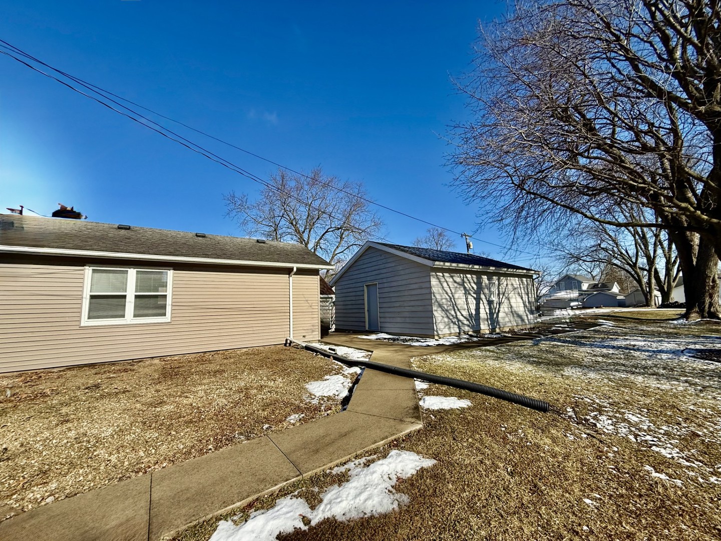 205 6th Avenue Mendota, IL 61342 - Photo 30 of 32 a view of a house with a yard