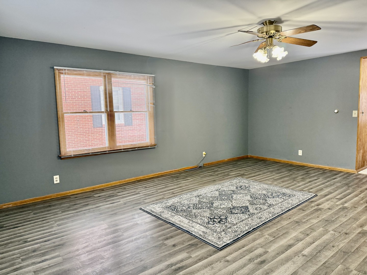 205 6th Avenue Mendota, IL 61342 - Photo 8 of 32 a view of a room with window & ceiling fan