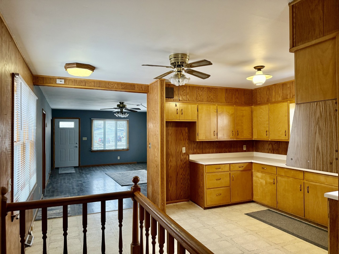 205 6th Avenue Mendota, IL 61342 - Photo 10 of 32 a kitchen with a stove a sink and a refrigerator