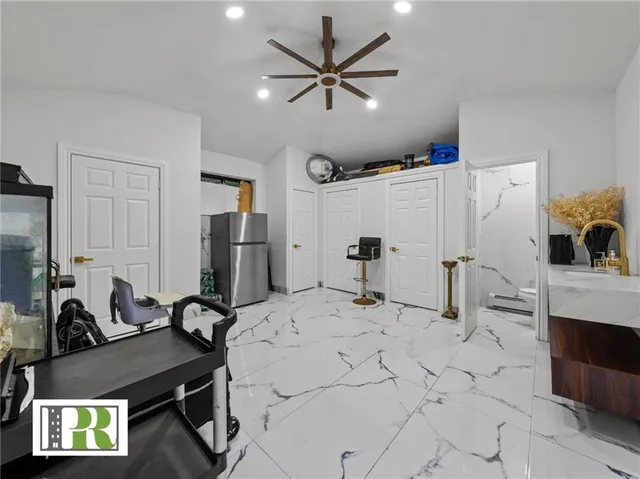 a view of a workspace with furniture