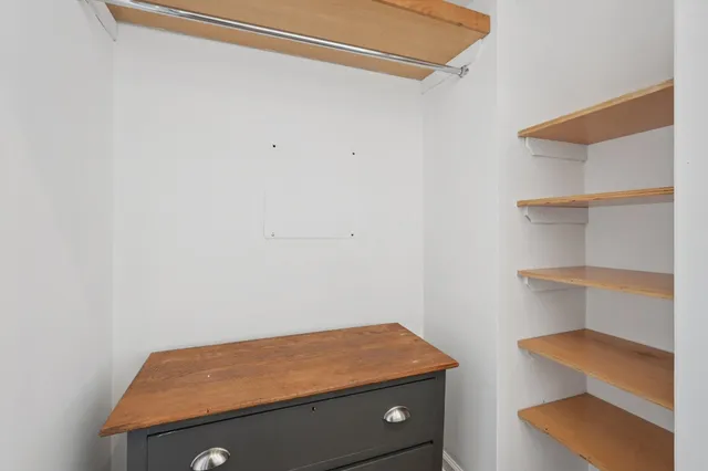 a room with storage and utility