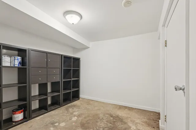 a view of empty room with empty racks