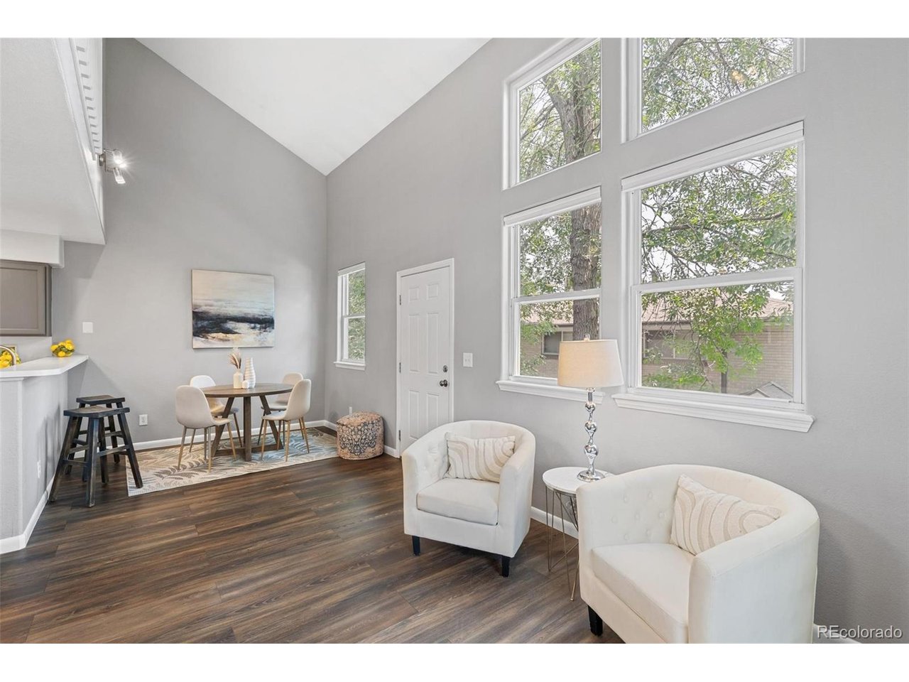 6450 West 44th Place, Unit B Wheat Ridge, CO 80033 - Photo 2 of 35 Sunlit Living, Dining, and Kitchen!