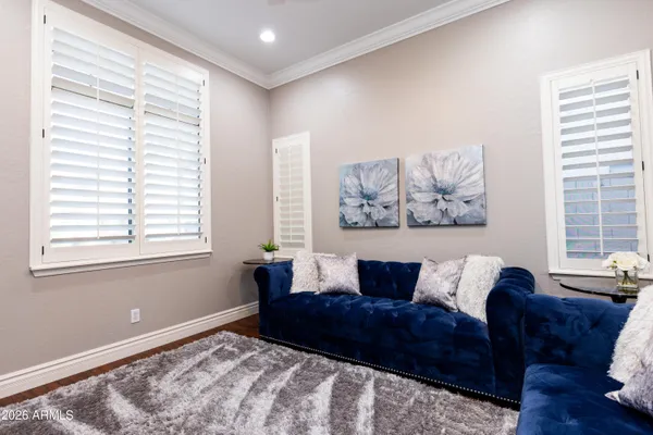 a living room with furniture and a window