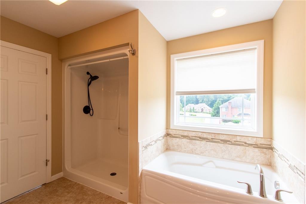 105 Pheasant Ridge Drive Butler, PA 16001 - Photo 19 of 42 separate shower and tub for long days