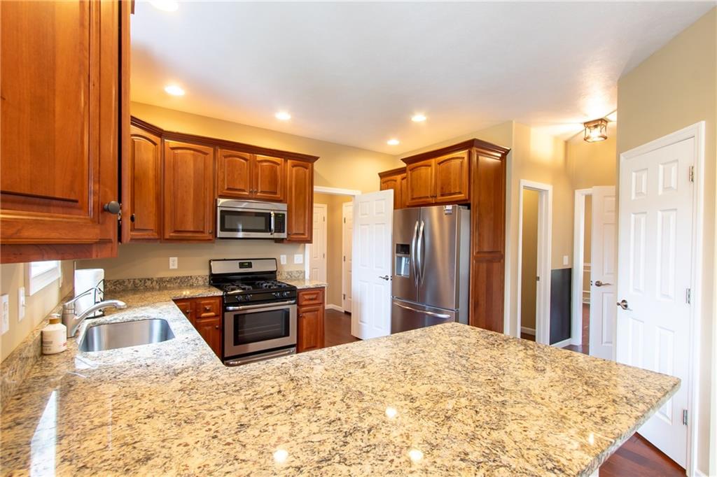 105 Pheasant Ridge Drive Butler, PA 16001 - Photo 4 of 42 Cherry Cabinets and Granite Countertops