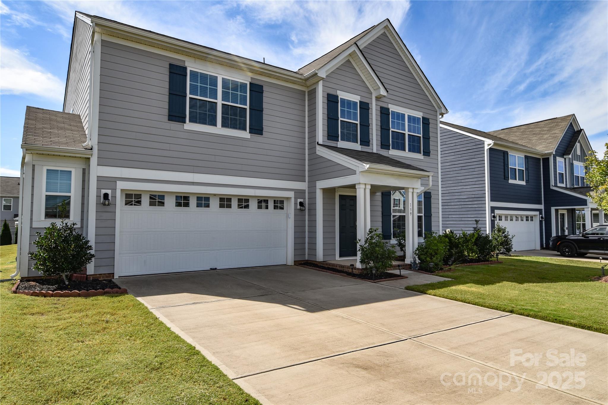 139 West Neel Ranch Road Mooresville, NC 28115 - Photo 1 of 40 a front view of house with yard