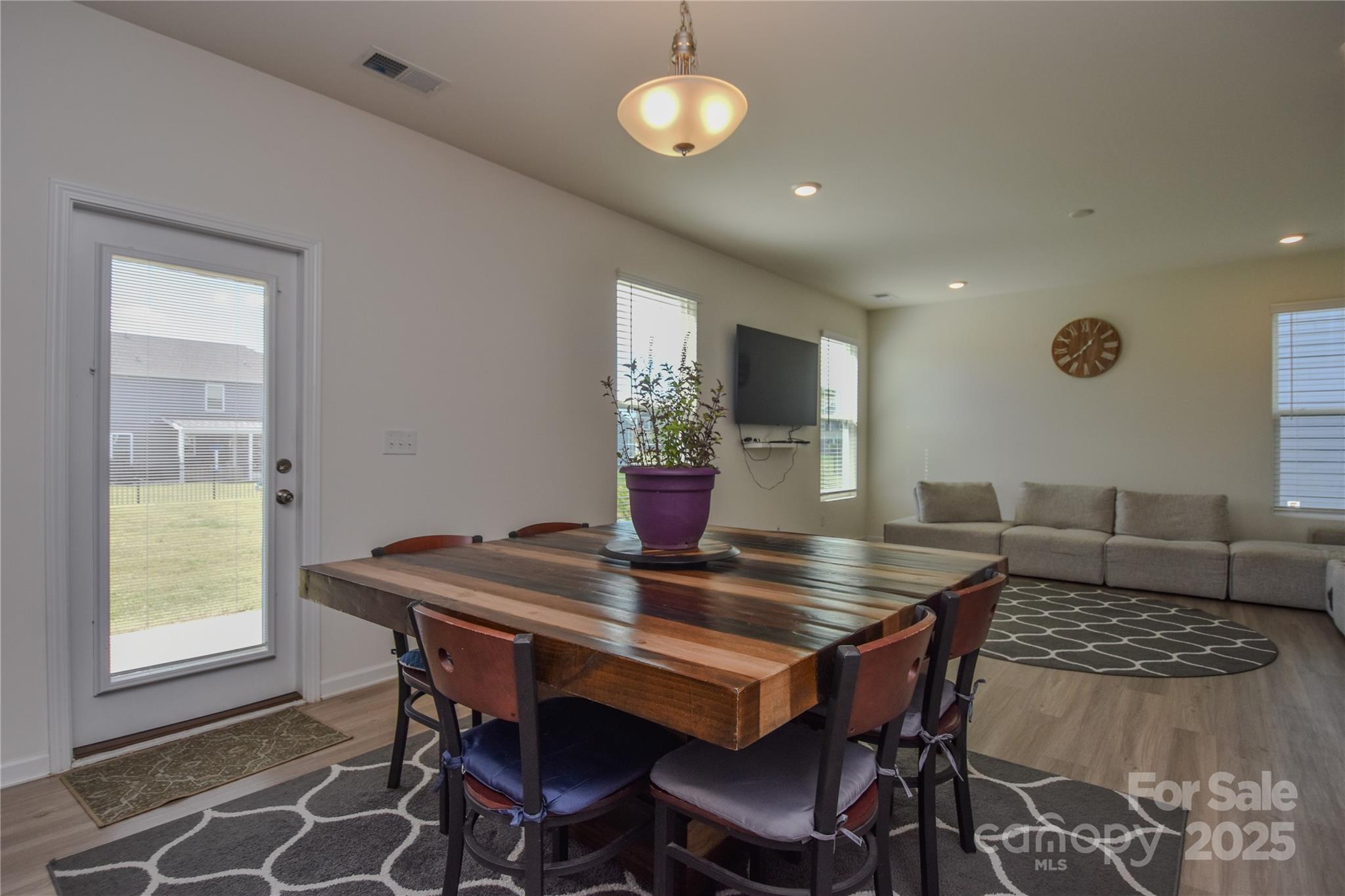 139 West Neel Ranch Road Mooresville, NC 28115 - Photo 13 of 40 a view of a dining room with furniture