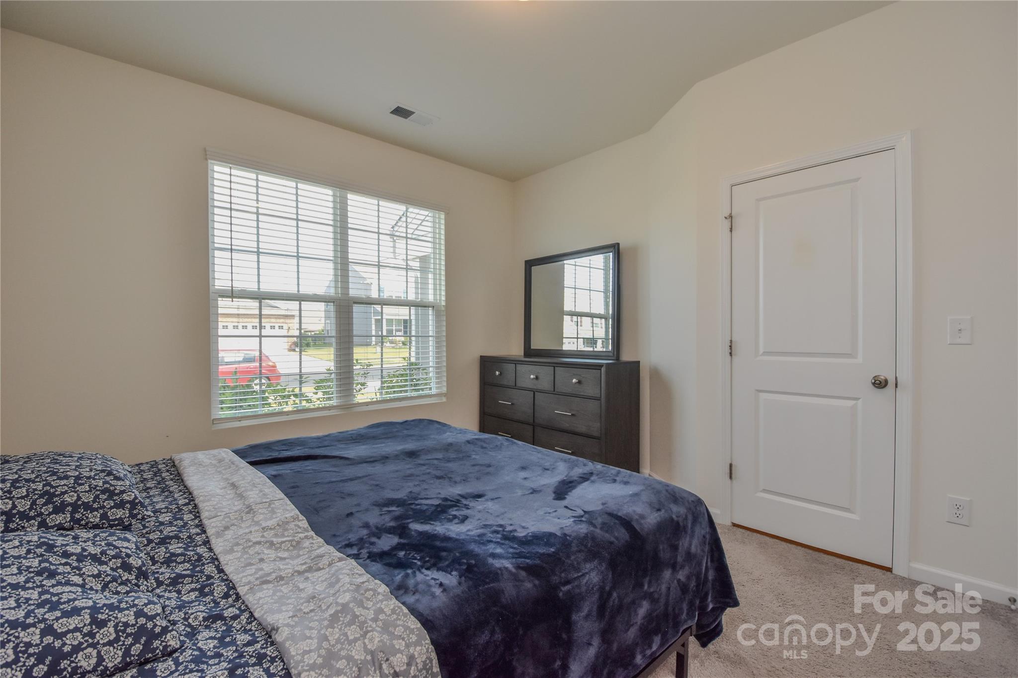 139 West Neel Ranch Road Mooresville, NC 28115 - Photo 14 of 40 a bedroom with a bed dresser and a window
