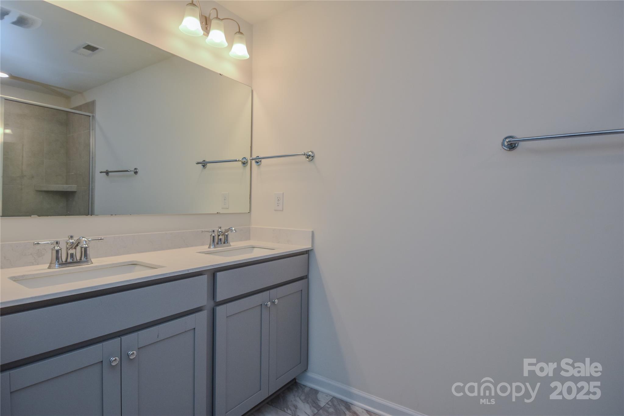139 West Neel Ranch Road Mooresville, NC 28115 - Photo 20 of 40 a bathroom with a sink and a mirror