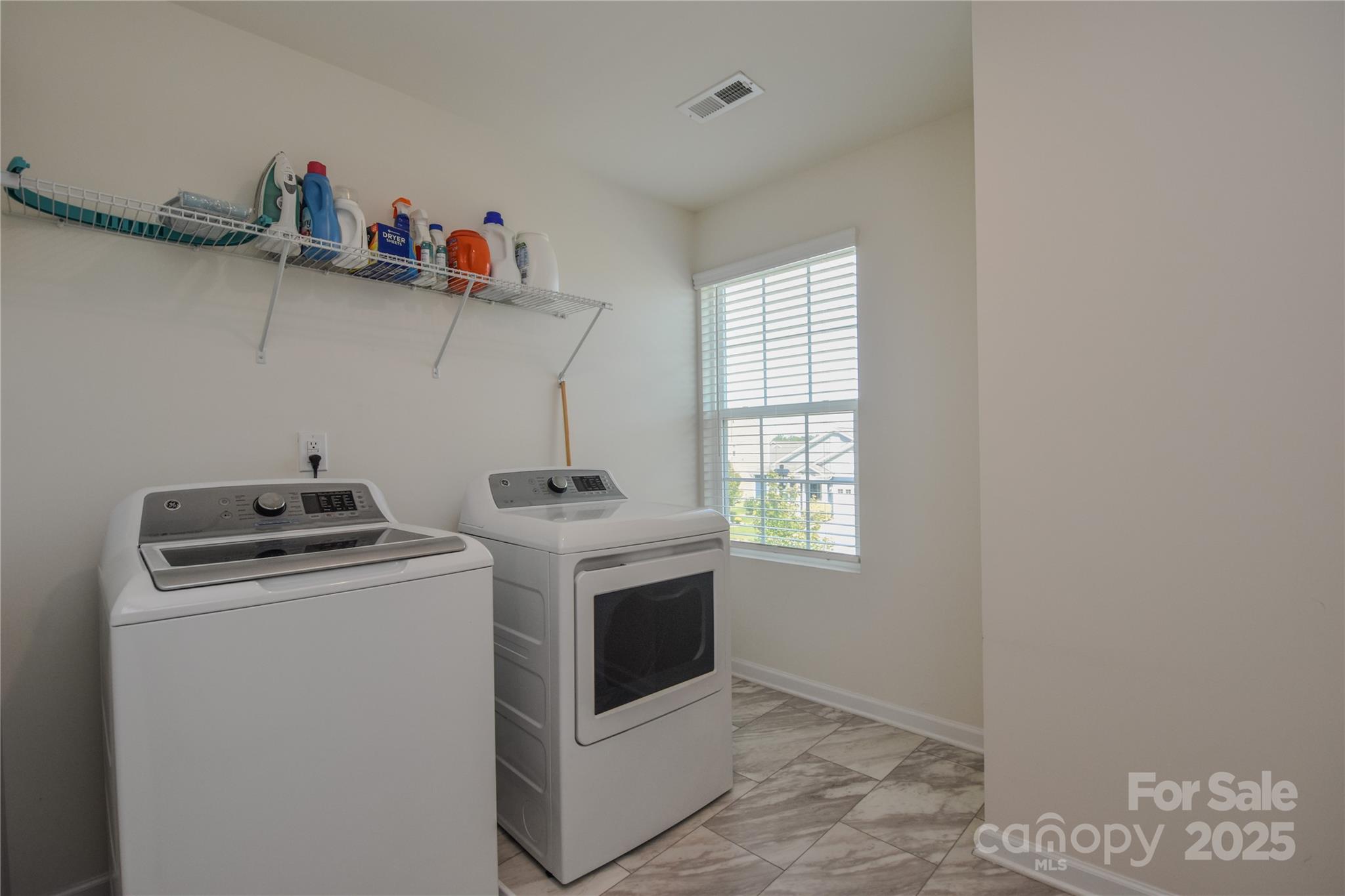 139 West Neel Ranch Road Mooresville, NC 28115 - Photo 25 of 40 a utility room with dryer and washer