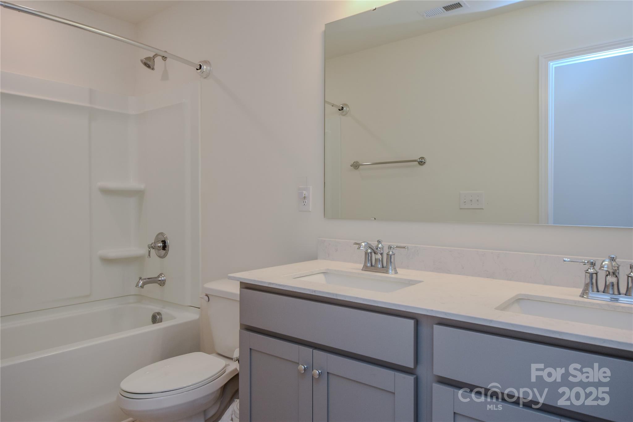 139 West Neel Ranch Road Mooresville, NC 28115 - Photo 30 of 40 a bathroom with a sink a toilet and shower