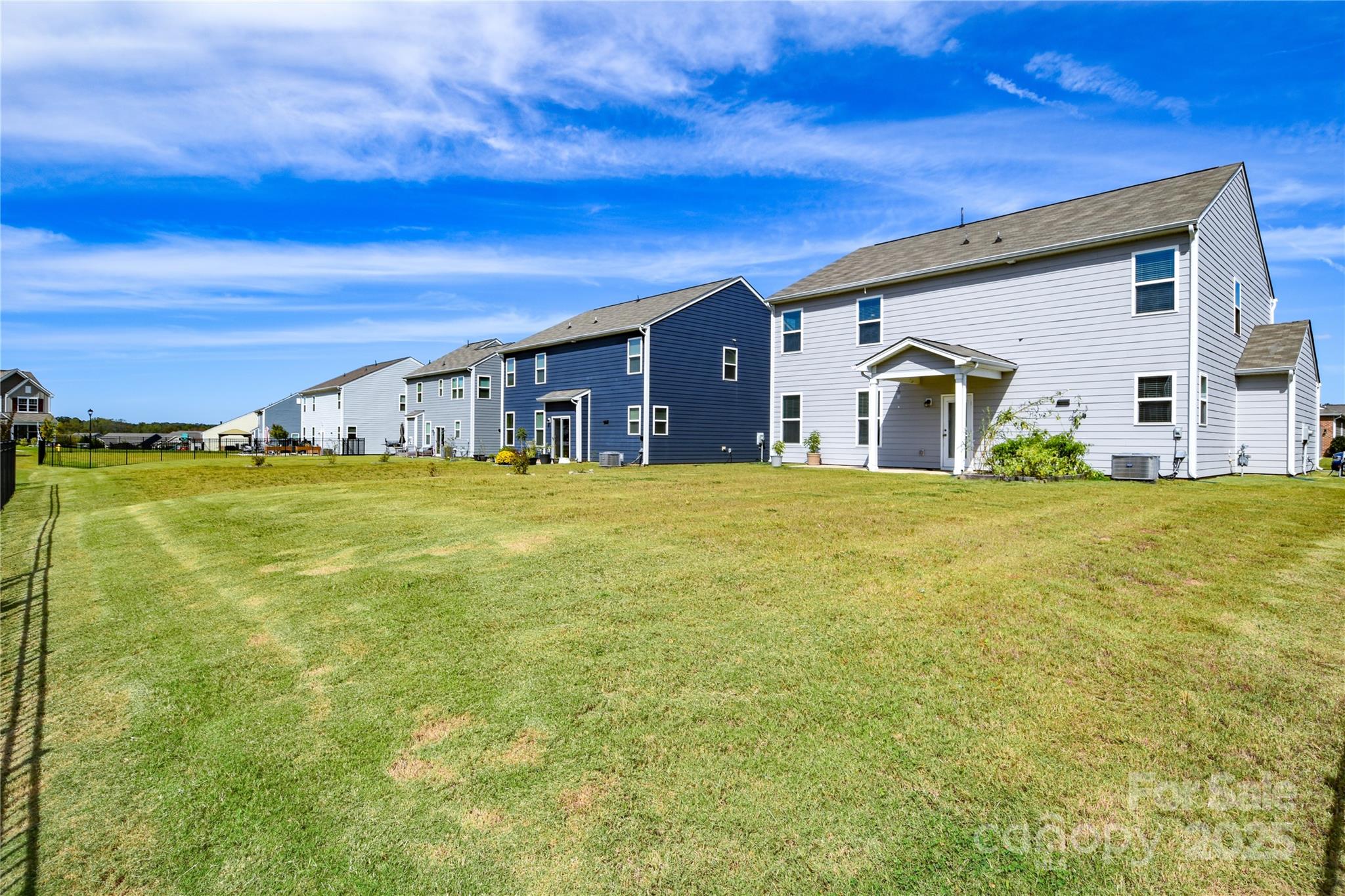 139 West Neel Ranch Road Mooresville, NC 28115 - Photo 37 of 40 a view of a house with a big yard