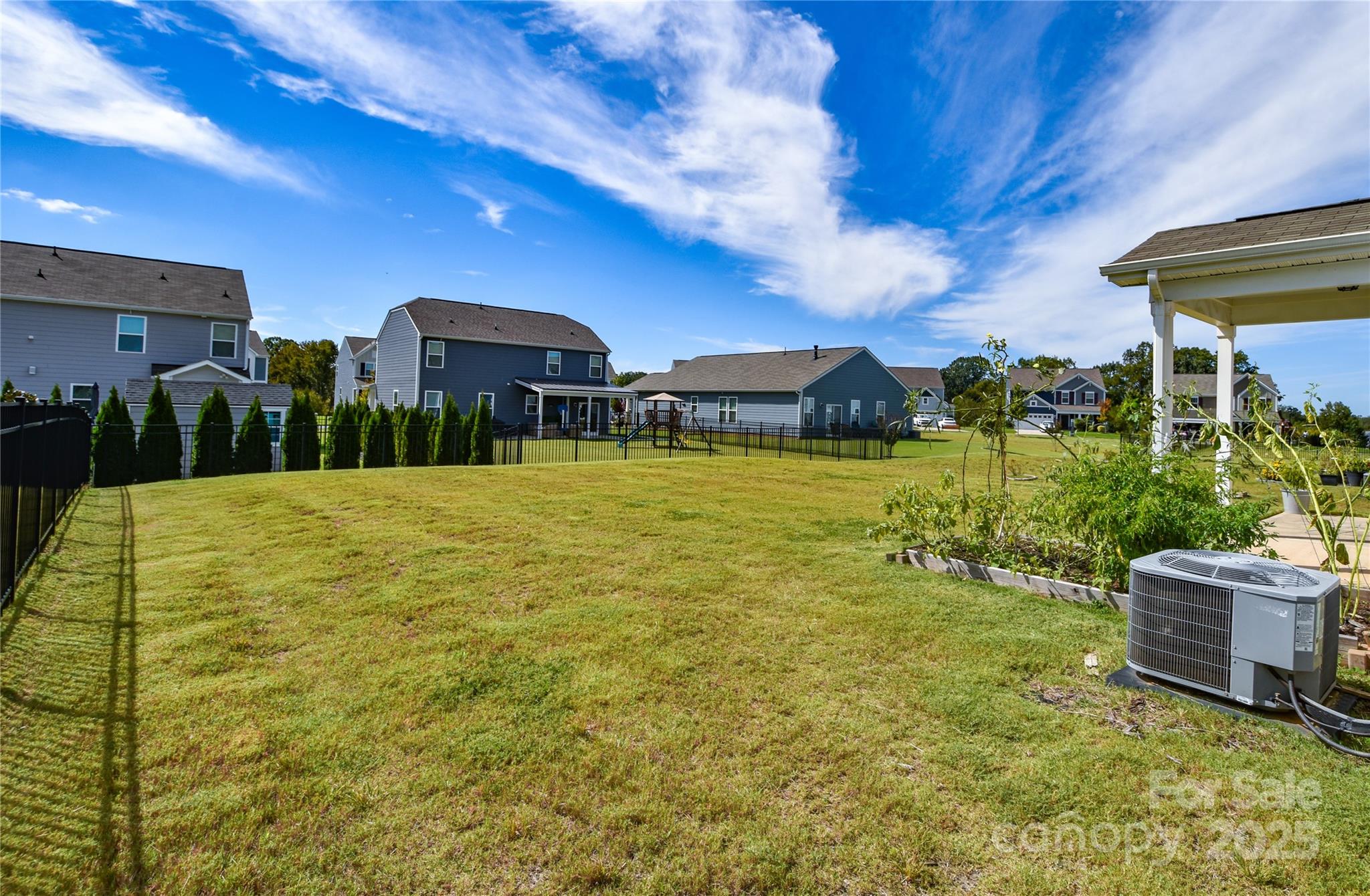 139 West Neel Ranch Road Mooresville, NC 28115 - Photo 38 of 40 a view of a house with a yard