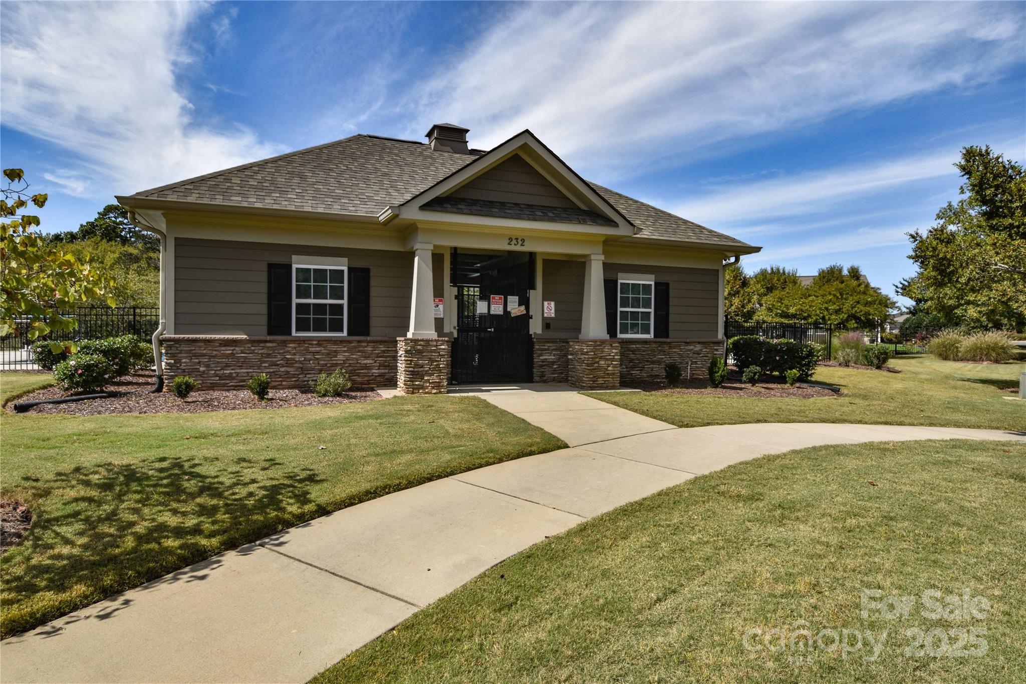 139 West Neel Ranch Road Mooresville, NC 28115 - Photo 40 of 40 a front view of a house with garden