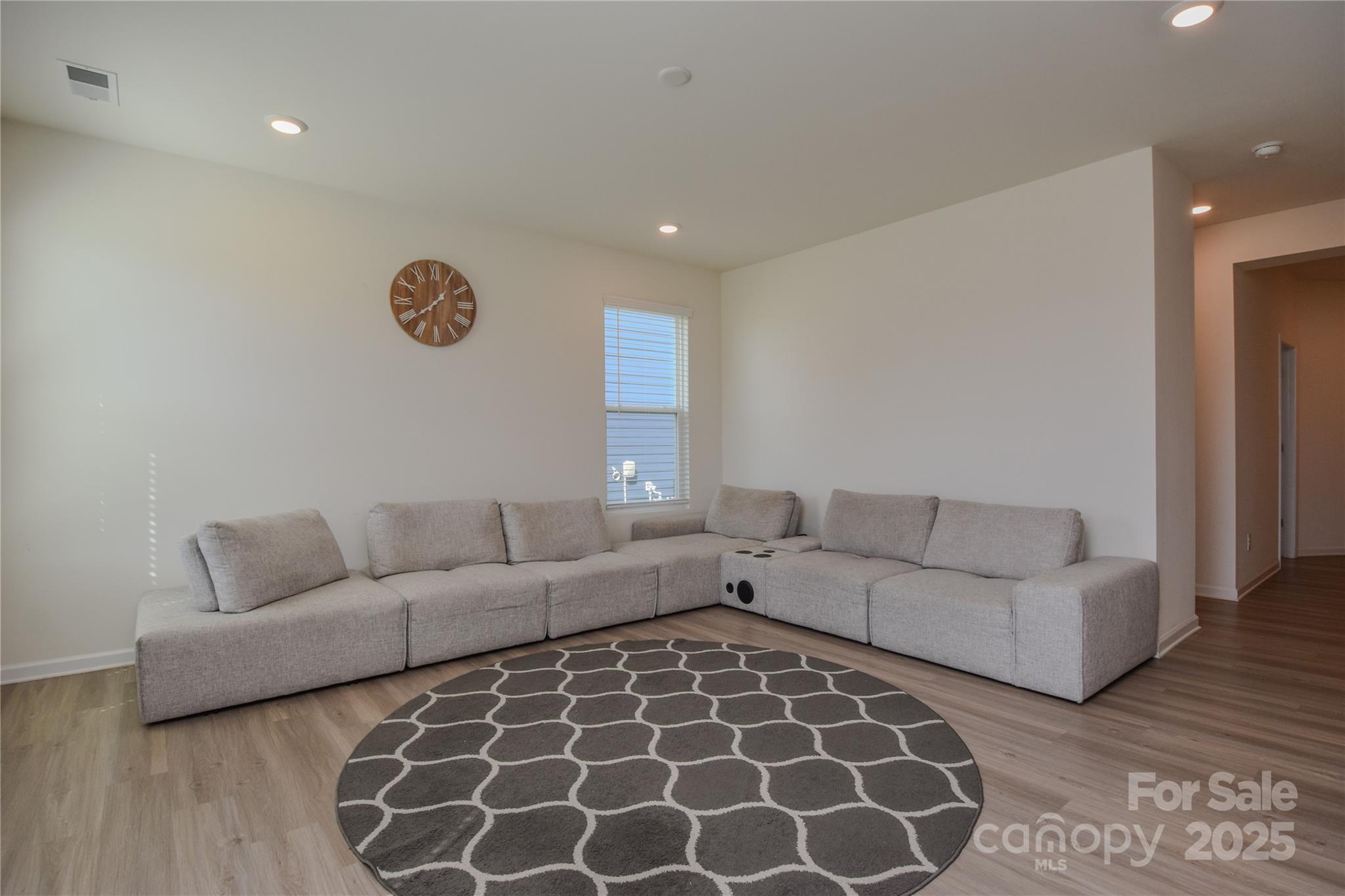 139 West Neel Ranch Road Mooresville, NC 28115 - Photo 6 of 40 a living room with furniture and a window
