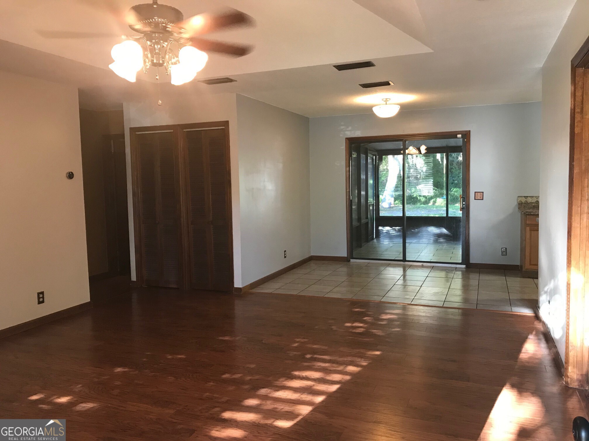 390 Powderhorn Road St. Marys, GA 31558 - Photo 2 of 18 a view of livingroom with furniture wooden floor and window