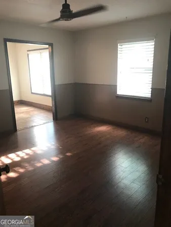 a view of an empty room and window
