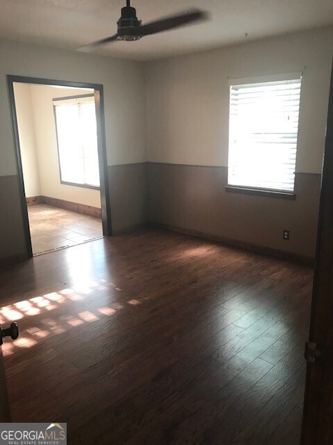 390 Powderhorn Road St. Marys, GA 31558 - Photo 8 of 18 a view of an empty room and window