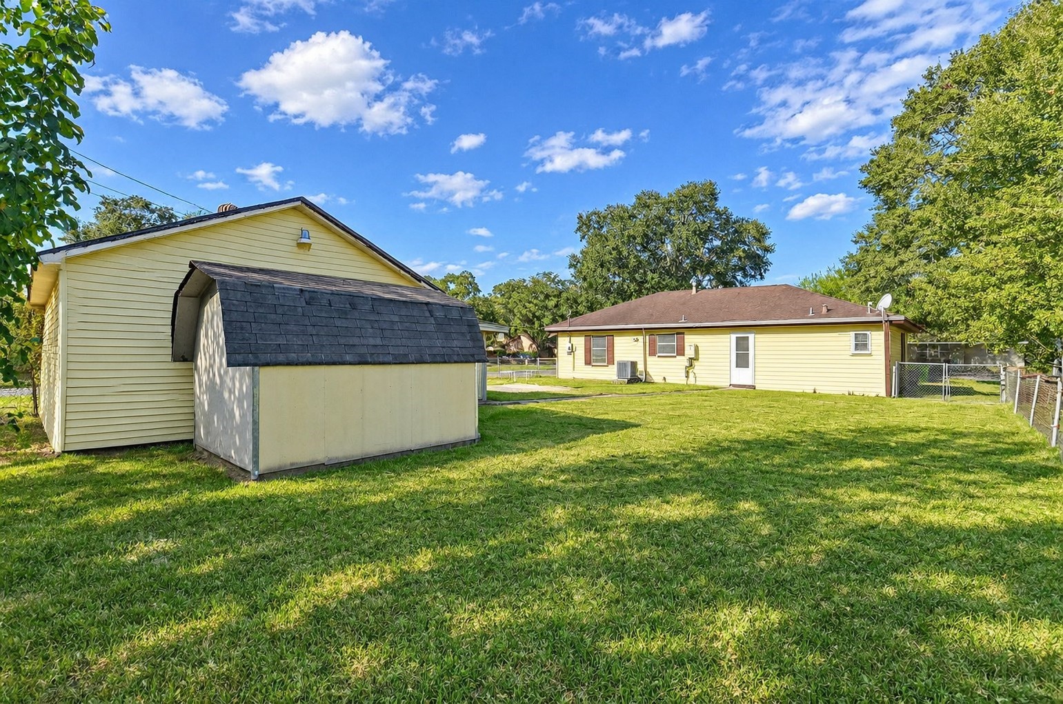 1713 Frost Street Rosenberg, TX 77471 - Photo 4 of 24 Small shed behind the garage