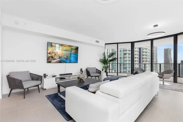 a view of room with furniture and a window