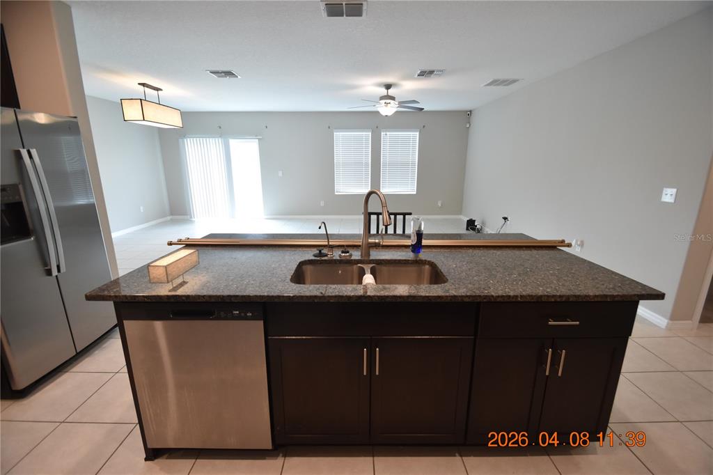 2187 Old Mining Road Lakeland, FL 33801 - Photo 18 of 65 a kitchen with a sink and cabinets