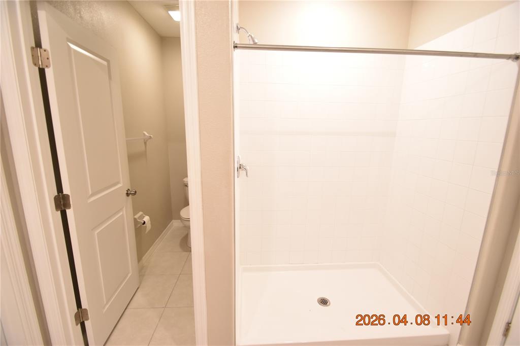 2187 Old Mining Road Lakeland, FL 33801 - Photo 26 of 65 a picture of a bathroom with a shower