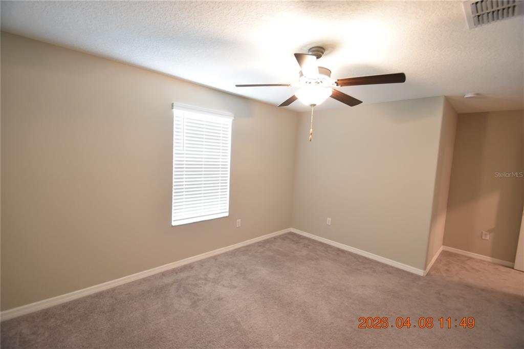 2187 Old Mining Road Lakeland, FL 33801 - Photo 41 of 65 a view of a room with windows and ceiling fan