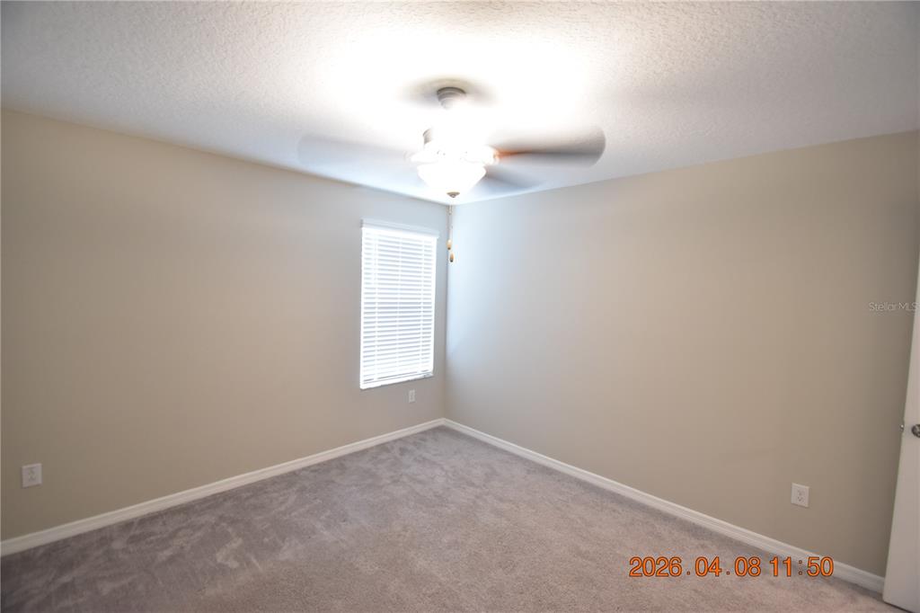 2187 Old Mining Road Lakeland, FL 33801 - Photo 49 of 65 a view of an empty room with a window
