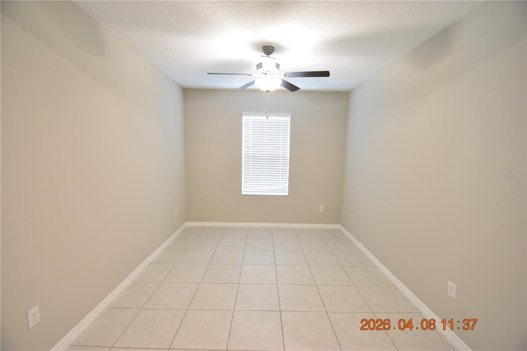 2187 Old Mining Road Lakeland, FL 33801 - Photo 6 of 65 a view of an empty room with a window