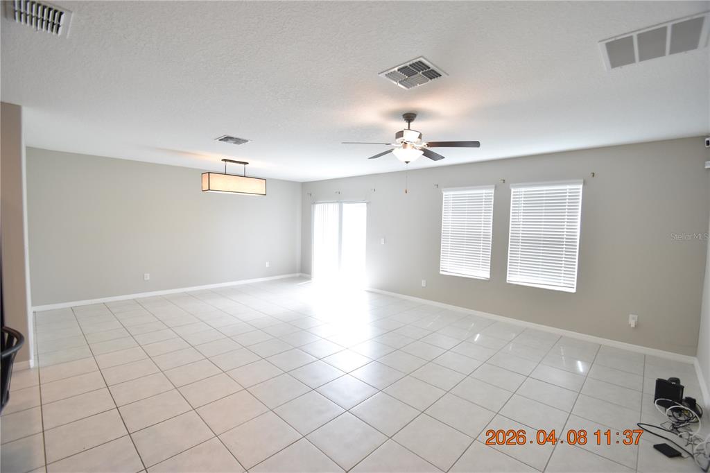 2187 Old Mining Road Lakeland, FL 33801 - Photo 7 of 65 a view of an empty room with a window